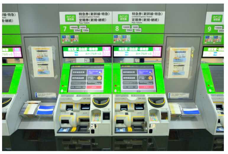 Green ticket vending machine